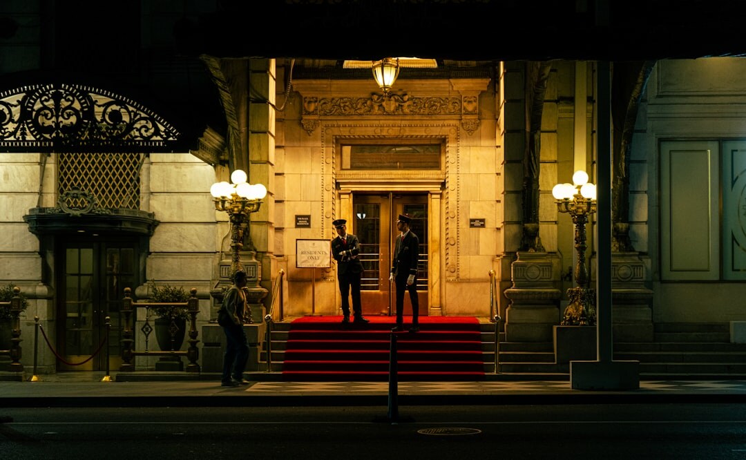 Celebrity walking on a red carpet at a premiere event