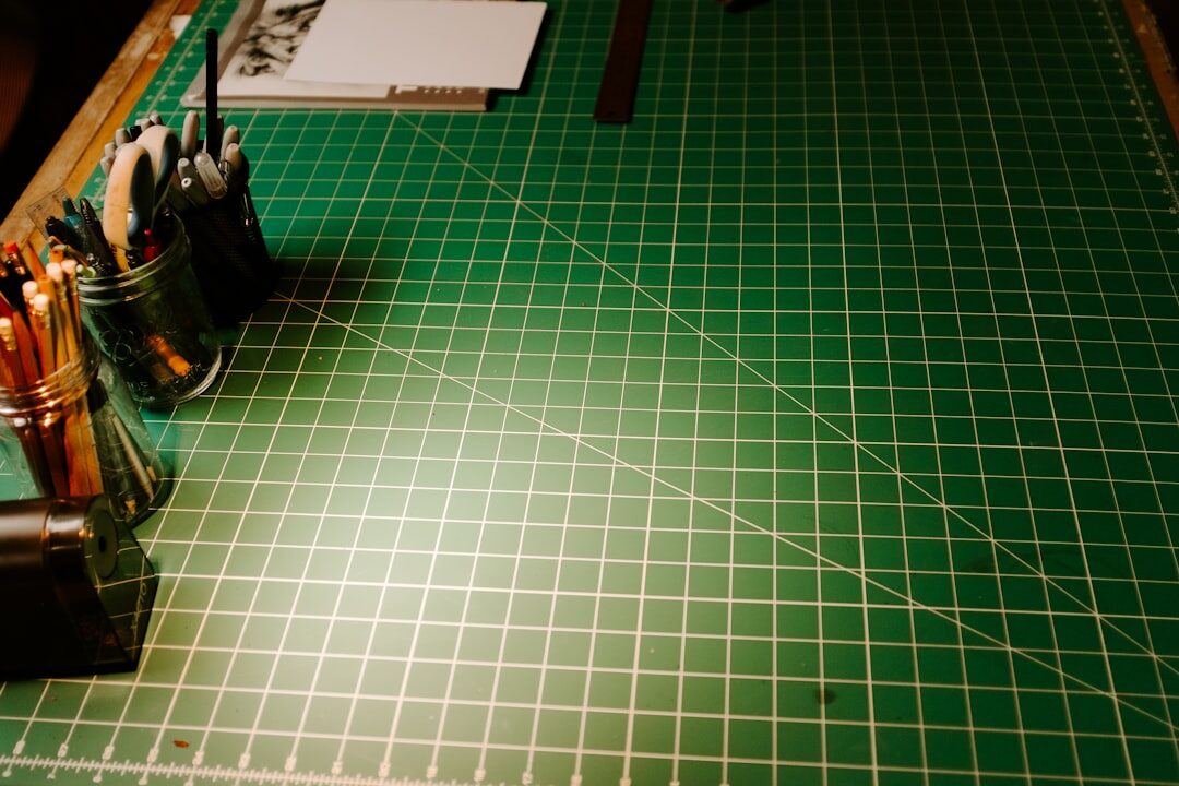 Modern newsroom office with desks and monitors