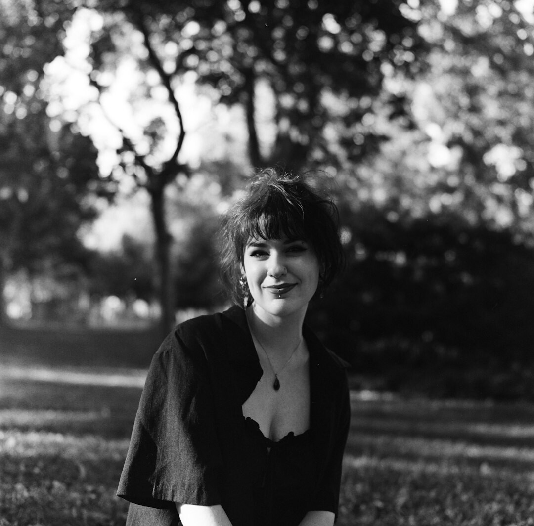 Portrait of a woman editor with short hair smiling