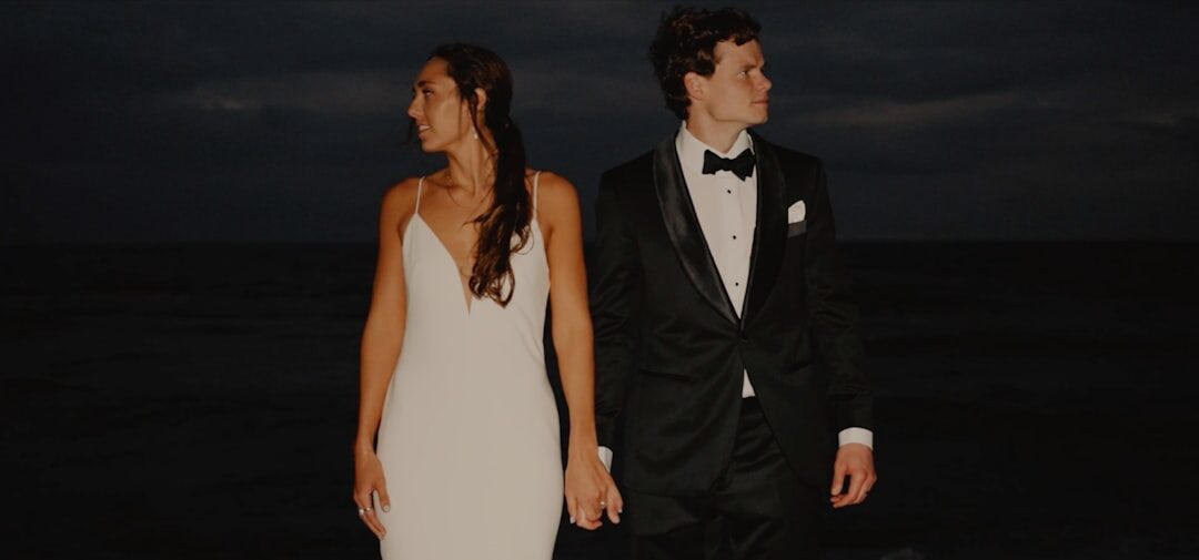 Elegant couple walking together at an evening event