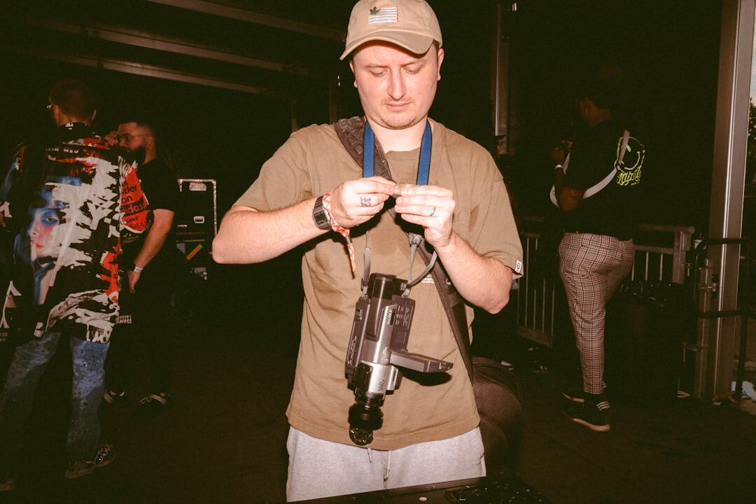 Photographer holding a camera at an event